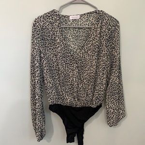 Vestique animal print bodysuit